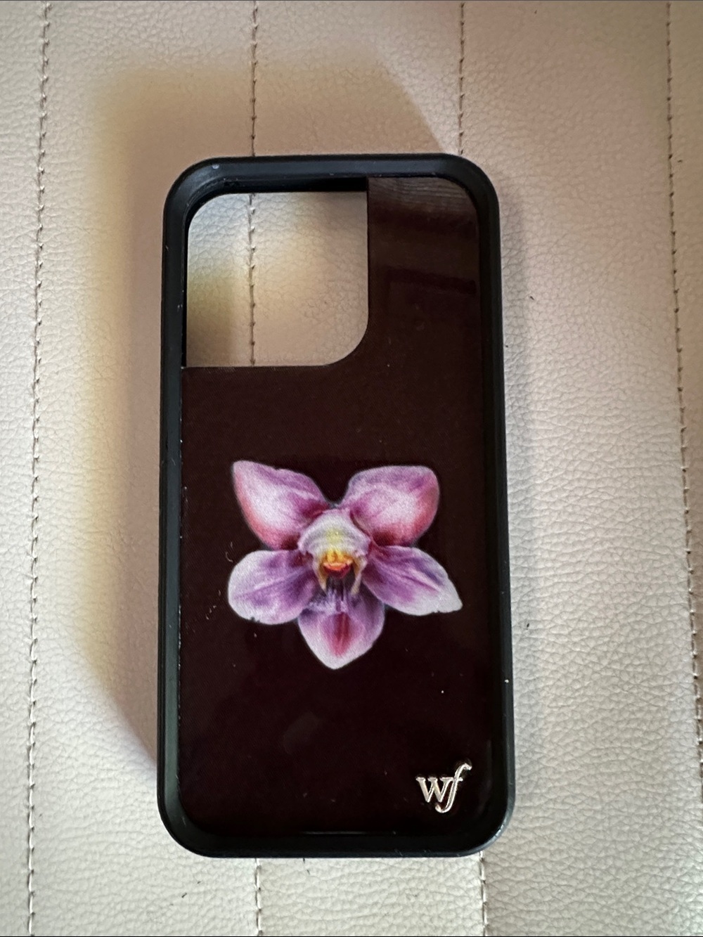 WILD FLOWER iPhone 14 pro phone case w/ purple orchid on black background